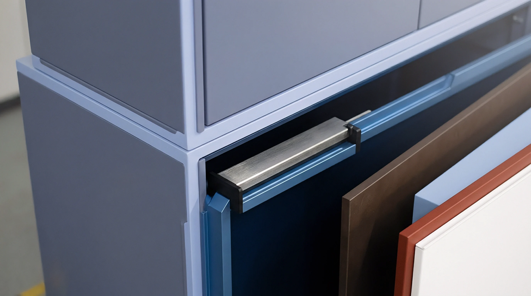 Various coated wood panels and sliding metal hardware mechanisms are mounted vertically inside a modular furniture production showroom display rack.